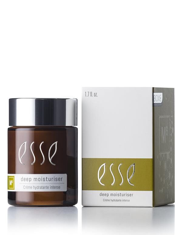A brown jar of Esse Deep Moisturiser with a silver lid is placed next to its white and olive-green box. Both the jar and the box display the brand name "Esse" along with product details. The jar contains 1.7 fl. oz. (50 ml) of deeply hydrating cream.